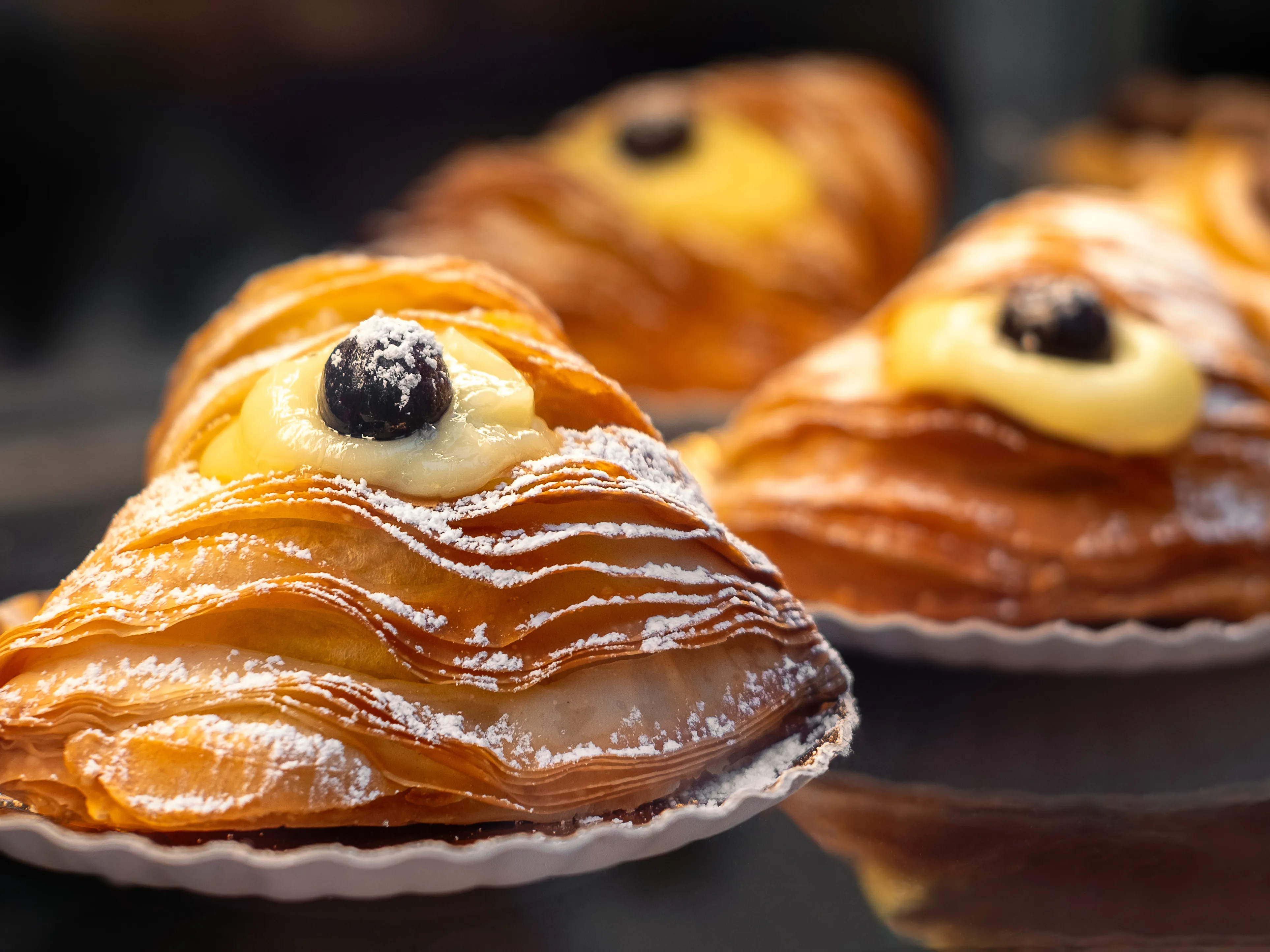 Sfogliatella and babà on Corso De Gasperi