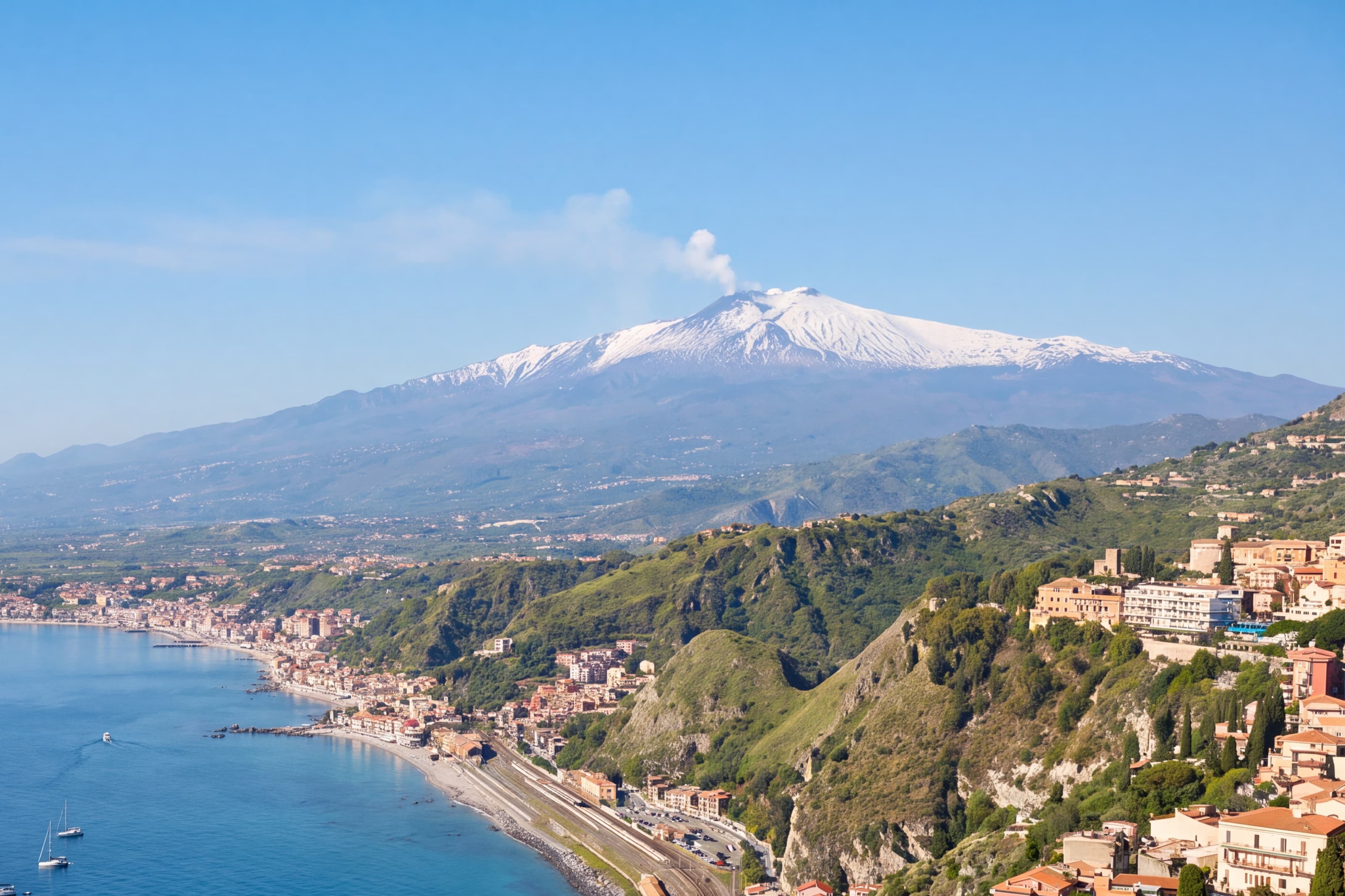 The bay of Giardini Naxos and Mount Etna seen from Taormina