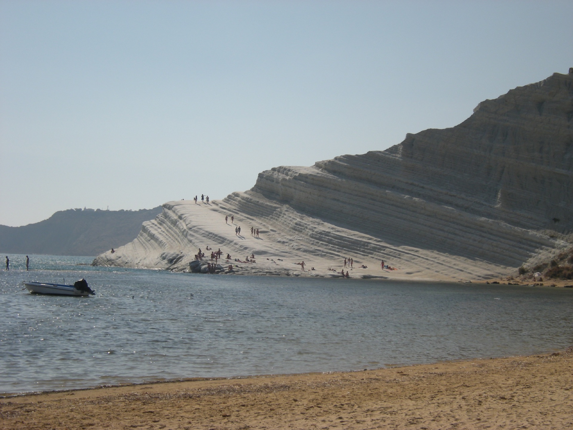 The white marl terraces of Scala dei Turchi on the Agrigento coast, photographed from the beach below