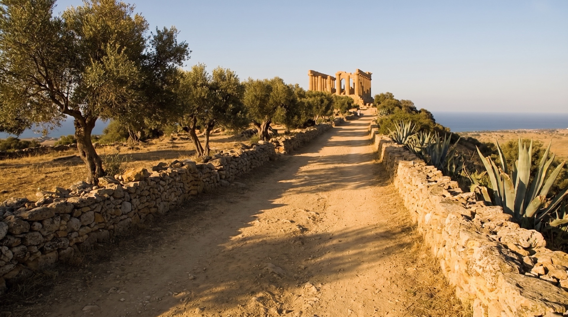 The path along the ridge of the Valley of the Temples at Agrigento, the long strip of Doric temples visitors walk between the Porta V and Giunone entrances