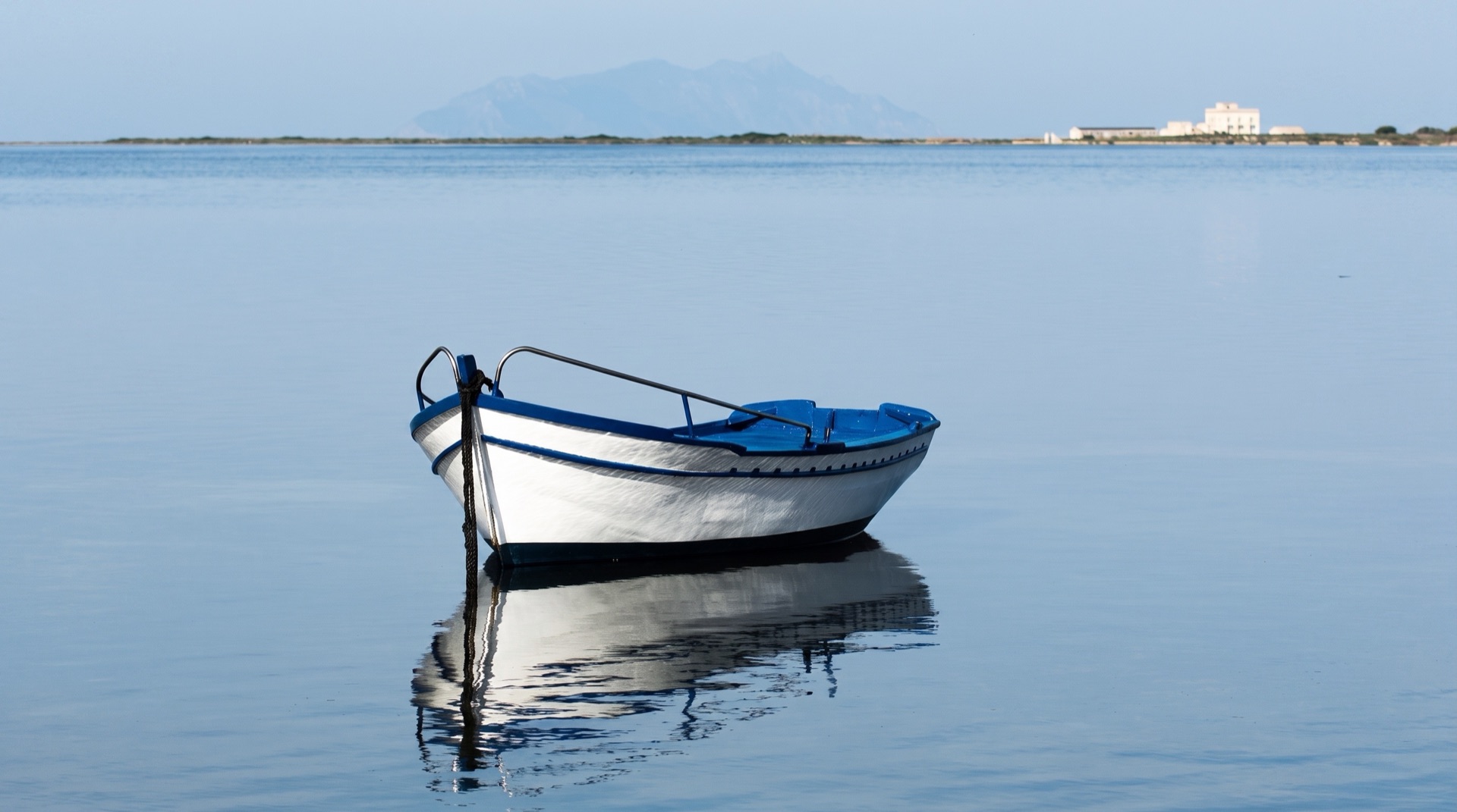 The shallow water of the Stagnone lagoon looking towards the island of Mozia, reached by ferries that leave every thirty minutes