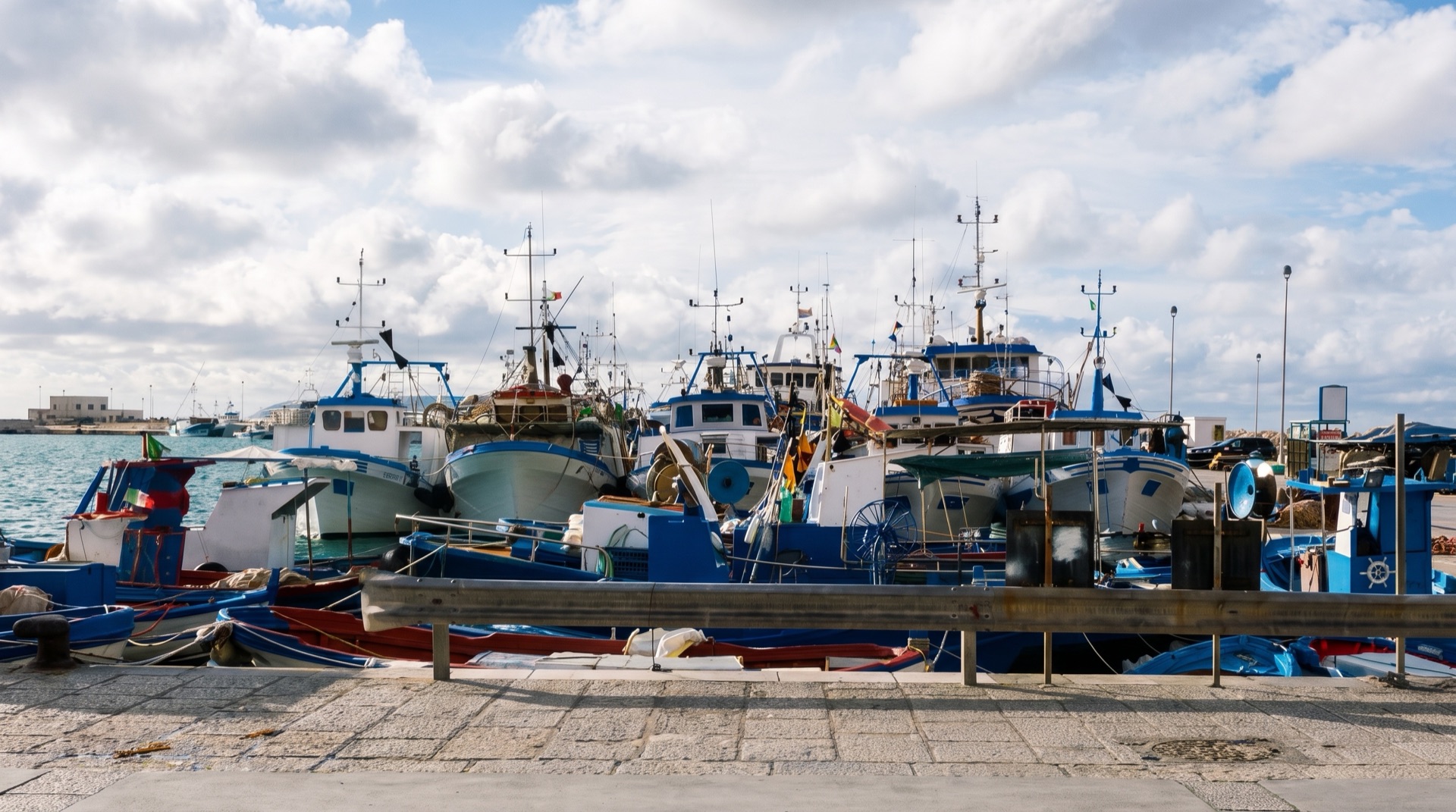 Fishing boats in Trapani harbour, close to the Liberty Lines hydrofoil pier for the Egadi islands on Via Ammiraglio Staiti