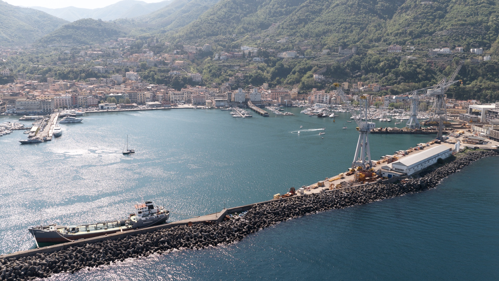 Aerial view of Castellammare di Stabia harbour and shipyards with Monte Faito behind